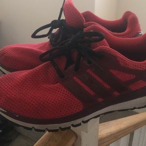 A size 8 Red Adidas Tennis Shoe